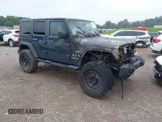 2008 Jeep Wrangler Unlimited X with VIN 1J4GA39198L509436, listed as a IAAI auction lot 42688885 with Not provided miles and . Bid and sale history available at DreamBid. Image 1.