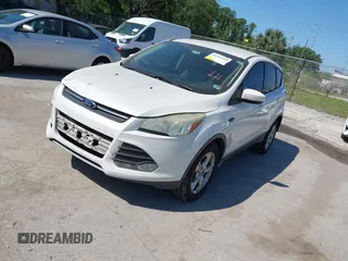 2015 Ford Escape SE with VIN 1FMCU0GX7FUA22322, listed as a IAAI auction lot 41942310 with 157,107 mi miles. Bid and sale history available at carsss.com. Image 2.