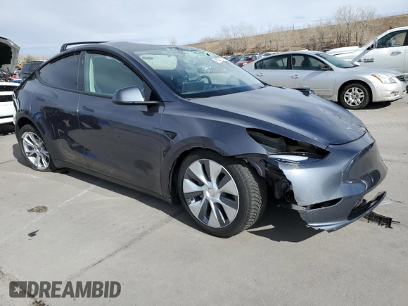 2023 Tesla Model Y Long Range with VIN 7SAYGAEE4PF873757, listed as a Copart auction lot 49530325 with 16,238 mi miles and Salvage Title. Bid and sale history available at DreamBid. Image 4.