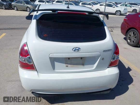 2007 Hyundai Accent GS with VIN KMHCM36C47U050161, listed as a IAAI auction lot 41762927 with 111,684 mi miles. Bid and sale history available at carsss.com. Image 16.