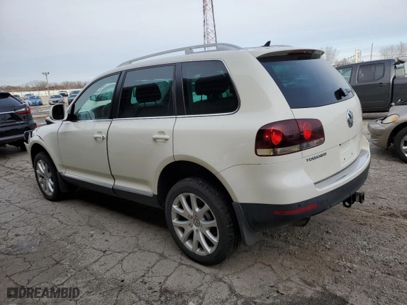 2009 Volkswagen Touareg 2 V6 with VIN WVGFM77L29D036572, listed as a Copart auction lot 87049934 with 101,623 mi miles and Salvage Title. Bid and sale history available at carsss.com. Image 2.