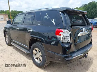 2012 Toyota 4Runner SR5 with VIN JTEZU5JR4C5042986, listed as a IAAI auction lot 42496203 with 153,431 mi miles and . Bid and sale history available at DreamBid. Image 3.