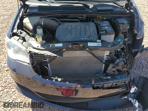 2015 Dodge Grand Caravan SE with VIN 2C4RDGBG2FR606297, listed as a Copart auction lot 53870875 with 35,676 mi miles and Salvage Title. Bid and sale history available at DreamBid. Image 12.