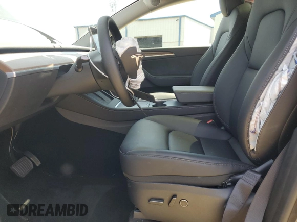 2024 Tesla Model Y with VIN 7SAYGDED6RF091715, listed as a Copart auction lot 56535585 with 23,120 mi miles and Salvage title. Bid and sale history available at DreamBid. Image 7.