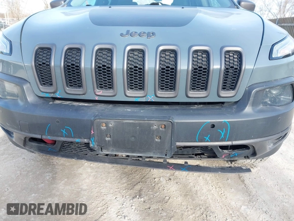 2014 Jeep Cherokee Trailhawk z VIN 1C4PJMBS5EW147579, wystawiony jako IAAI lot #41781543 z przebiegiem 155 751 mil mil oraz . Historia ofert i sprzedaży dostępna na DreamBid. Obrazek 21.