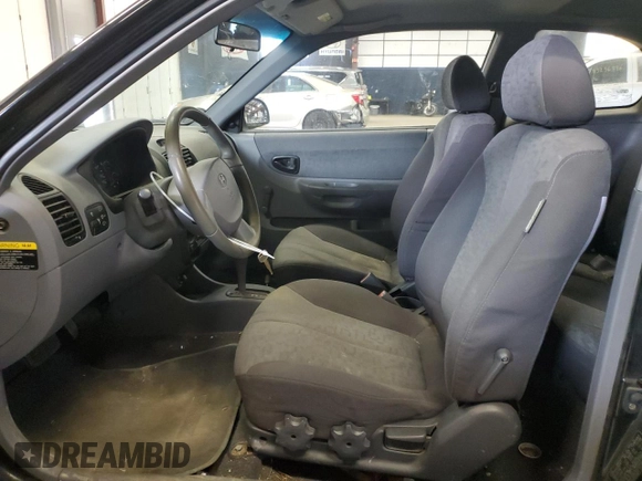 2005 Hyundai Accent GLS with VIN KMHCG35C95U327960, listed as a Copart auction lot 77151314 with 101,556 mi miles and Clean Title. Bid and sale history available at carsss.com. Image 7.