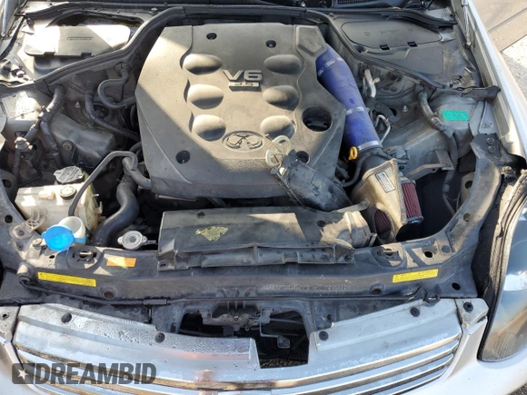 2003 Infiniti G35 w/Leather z VIN JNKCV51EX3M323196, wystawiony jako Copart lot #55445135 z przebiegiem 268 666 mil mil oraz Szkoda całkowita • Salvage title. Historia ofert i sprzedaży dostępna na DreamBid. Obrazek 11.