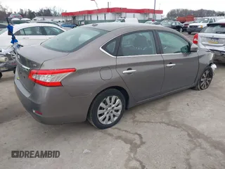 2015 Nissan Sentra SR with VIN 3N1AB7AP8FL638384, listed as a IAAI auction lot 41321674 with 104,023 mi miles and . Bid and sale history available at DreamBid. Image 4.