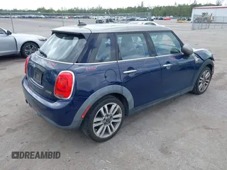2017 MINI Hardtop 4 Door Cooper with VIN WMWXU1C54H2E19114, listed as a IAAI auction lot 42107266 with 83,524 mi miles and . Bid and sale history available at DreamBid. Image 4.