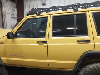 2001 Jeep Cherokee Sport with VIN 1J4FF48S41L580319, listed as a IAAI auction lot 42064564 with 257,534 mi miles and . Bid and sale history available at DreamBid. Image 14.