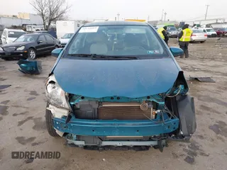 2013 Toyota Yaris L with VIN JTDJTUD38DD553999, listed as a IAAI auction lot 41642903 with 75,795 mi miles. Bid and sale history available at carsss.com. Image 12.