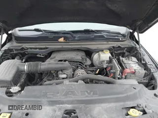 2019 Ram 1500 Rebel z VIN 1C6SRFLT6KN599362, wystawiony jako IAAI lot #41560018 z przebiegiem Nie podano mil oraz . Historia ofert i sprzedaży dostępna na DreamBid. Obrazek 10.