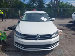 2017 Volkswagen Jetta S with VIN 3VW2B7AJXHM374687, listed as a IAAI auction lot 42596302 with 63,728 mi miles and . Bid and sale history available at DreamBid. Image 12.