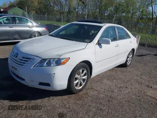 2009 Toyota Camry with VIN 4T1BE46K49U813806, listed as a IAAI auction lot 42141396 with 165,619 mi miles. Bid and sale history available at carsss.com. Image 2.