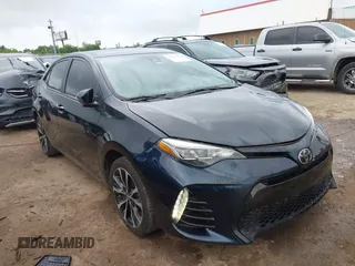 2017 Toyota Corolla L z VIN 5YFBURHE3HP647169, wystawiony jako IAAI lot #42219978 z przebiegiem 75 492 mil mil oraz . Historia ofert i sprzedaży dostępna na DreamBid. Obrazek 1.