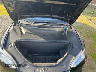 2017 Tesla Model S 60 with VIN 5YJSA1E15HF219286, listed as a Copart auction lot 84771024 with 43,259 mi miles and Salvage title. Bid and sale history available at DreamBid. Image 7.