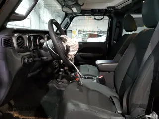2020 Jeep Wrangler Sport S with VIN 1C4GJXAN0LW131400, listed as a Copart auction lot 44266995 with 73,576 mi miles and Salvage title. Bid and sale history available at DreamBid. Image 7.
