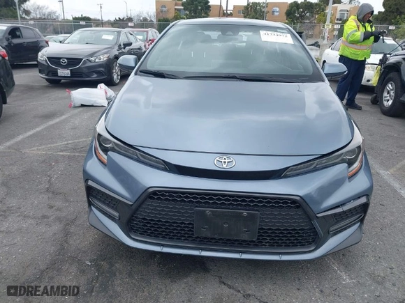 2021 Toyota Corolla SE with VIN JTDS4MCE8MJ065982, listed as a IAAI auction lot 41734972 with 59,039 mi miles. Bid and sale history available at carsss.com. Image 12.