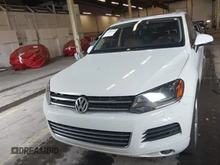 2013 Volkswagen Touareg Lux with VIN WVGEF9BP6DD007323, listed as a IAAI auction lot 41488959 with 123,383 mi miles and . Bid and sale history available at DreamBid. Image 13.