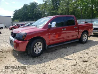 2006 Nissan Titan XE with VIN 1N6BA07A46N567566, listed as a Copart auction lot 62355015 with 176,903 mi miles and Salvage title. Bid and sale history available at DreamBid. Image 1.