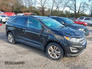 2015 Ford Edge Titanium z VIN 2FMTK4K94FBC01395, wystawiony jako IAAI lot #41073678 z przebiegiem 102 563 mil mil oraz . Historia ofert i sprzedaży dostępna na DreamBid. Obrazek 1.