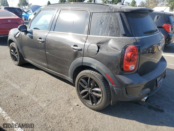 2015 MINI Cooper Countryman S with VIN WMWZC3C59FWT03319, listed as a Copart auction lot 79774934 with 151,556 mi miles and Salvage Title. Bid and sale history available at carsss.com. Image 2.