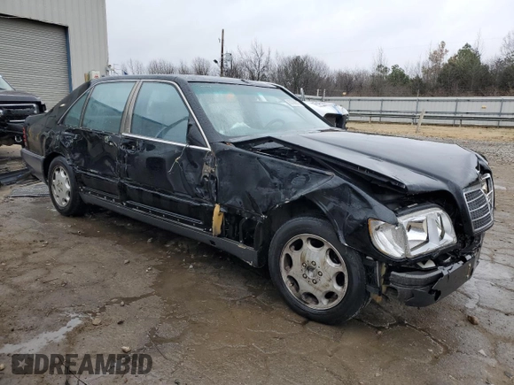 1994 Mercedes-Benz S with VIN WDBGA43E1RA183733, listed as a Copart auction lot 69675834 with Not Provided miles and Salvage Title. Bid and sale history available at DreamBid. Image 4.