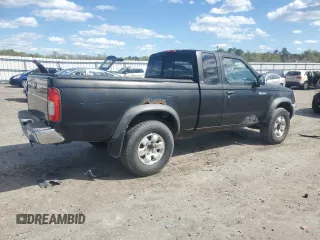 1999 Nissan Frontier XE z VIN 1N6ED26Y2XC301913, wystawiony jako Copart lot #53152165 z przebiegiem 271 272 mil mil oraz Szkoda całkowita • Salvage title. Historia ofert i sprzedaży dostępna na DreamBid. Obrazek 3.