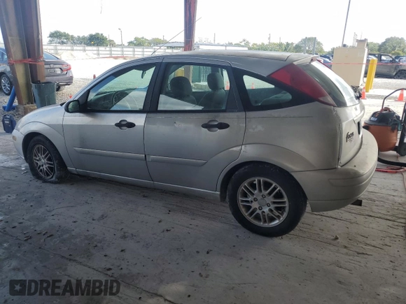 2004 Ford Focus ZX5 z VIN 3FAFP37394R122388, wystawiony jako Copart lot #45163225 z przebiegiem 259 554 mil mil oraz Czysty tytuł • Clean title. Historia ofert i sprzedaży dostępna na DreamBid. Obrazek 2.