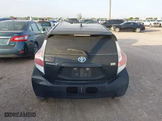 2016 Toyota Prius c One with VIN JTDKDTB35G1122931, listed as a IAAI auction lot 42009812 with 80,970 mi miles. Bid and sale history available at carsss.com. Image 15.