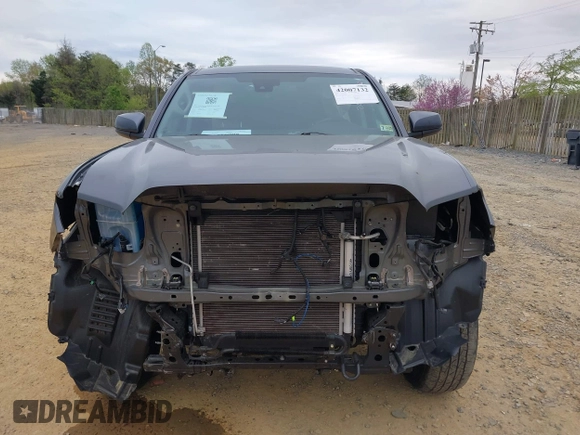 2022 Toyota Tacoma SR with VIN 3TYCZ5AN3NT078324, listed as a IAAI auction lot 42007132 with 35,802 mi miles and . Bid and sale history available at DreamBid. Image 13.