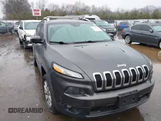 2014 Jeep Cherokee Latitude z VIN 1C4PJMCS5EW137875, wystawiony jako IAAI lot #41475923 z przebiegiem 124 565 mil mil oraz . Historia ofert i sprzedaży dostępna na DreamBid. Obrazek 1.