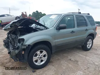 2006 Ford Escape XLT with VIN 1FMYU03146KD35945, listed as a IAAI auction lot 42337712 with 159,833 mi miles and . Bid and sale history available at DreamBid. Image 2.