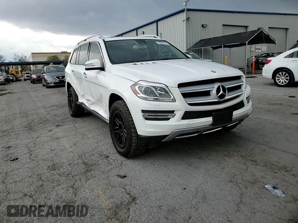 2014 Mercedes-Benz GL 450 z VIN 4JGDF7CE4EA314084, wystawiony jako Copart lot #59593195 z przebiegiem 161 026 mil mil oraz Szkoda całkowita • Salvage title. Historia ofert i sprzedaży dostępna na DreamBid. Obrazek 14.