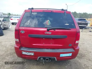 2005 Jeep Grand Cherokee Laredo with VIN 1J4HS48N95C711992, listed as a IAAI auction lot 41944696 with 209,299 mi miles and . Bid and sale history available at DreamBid. Image 16.