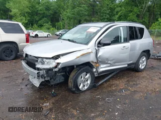 2014 Jeep Compass Sport with VIN 1C4NJCBA5ED620532, listed as a IAAI auction lot 42110469 with 137,177 mi miles. Bid and sale history available at carsss.com. Image 2.