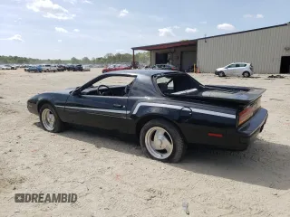 1987 Pontiac Firebird z VIN 1G2FS2184HL222415, wystawiony jako Copart lot #54878805 z przebiegiem 97 287 mil mil oraz Szkody całkowita. Historia ofert i sprzedaży dostępna na DreamBid. Obrazek 2.