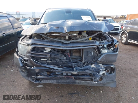 2022 Ram 1500 Big Horn with VIN 1C6SRFFT9NN388463, listed as a IAAI auction lot 41092683 with 225,407 mi miles and . Bid and sale history available at DreamBid. Image 12.