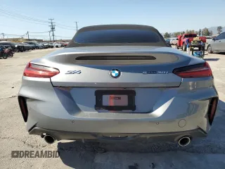 2024 BMW Z4 sDrive30i with VIN WBAHF3C06RWY36286, listed as a Copart auction lot 50296565 with 9,898 mi miles and Salvage title. Bid and sale history available at DreamBid. Image 6.