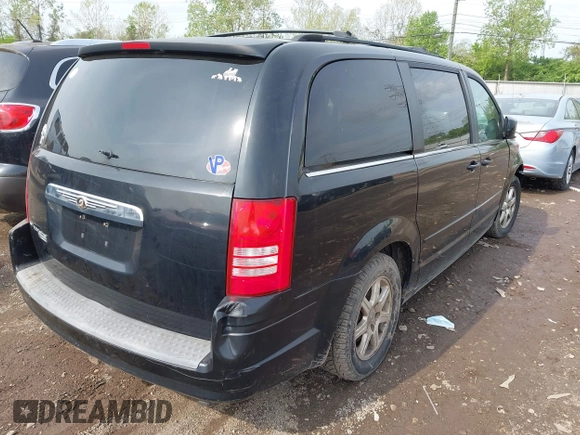 2008 Chrysler Town & Country Touring with VIN 2A8HR54P58R611777, listed as a IAAI auction lot 42149143 with 203,809 mi miles and . Bid and sale history available at carsss.com. Image 4.
