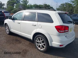 2012 Dodge Journey SXT with VIN 3C4PDCBG0CT206649, listed as a IAAI auction lot 42853311 with 146,686 mi miles and . Bid and sale history available at DreamBid. Image 3.