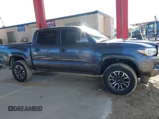2021 Toyota Tacoma SR5 with VIN 5TFAZ5CN4MX113669, listed as a IAAI auction lot 42468007 with 29,368 mi miles and . Bid and sale history available at DreamBid. Image 14.