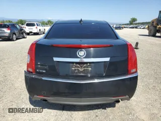 2010 Cadillac CTS z VIN 1G6DA5EG6A0146439, wystawiony jako Copart lot #57300915 z przebiegiem 113 680 mil mil oraz Szkoda całkowita • Salvage title. Historia ofert i sprzedaży dostępna na DreamBid. Obrazek 6.