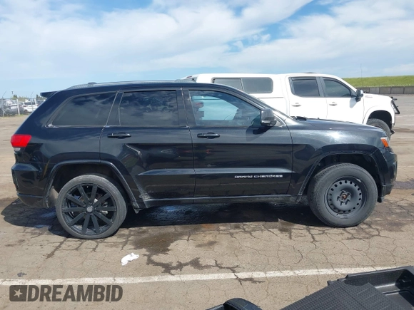2014 Jeep Grand Cherokee Overland with VIN 1C4RJFCT8EC106005, listed as a IAAI auction lot 41989721 with 148,469 mi miles and . Bid and sale history available at DreamBid. Image 14.