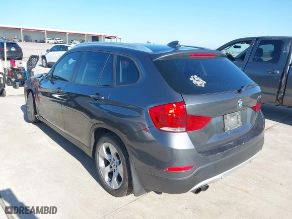 2014 BMW X1 sDrive28i with VIN WBAVM1C57EVW47767, listed as a IAAI auction lot 41867313 with 90,431 mi miles. Bid and sale history available at carsss.com. Image 3.