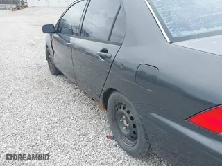 2003 Mitsubishi Lancer ES with VIN JA3AJ26E83U015342, listed as a IAAI auction lot 41819617 with 355,658 mi miles. Bid and sale history available at carsss.com. Image 13.