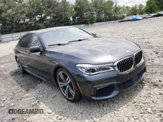 2016 BMW 7 Series 750i xDrive with VIN WBA7F2C5XGG418225, listed as a Copart auction lot 54860623 with 76,980 mi miles and . Bid and sale history available at DreamBid. Image 4.