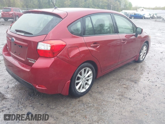 2012 Subaru Impreza Premium with VIN JF1GPAC60CH229287, listed as a IAAI auction lot 42209207 with 115,125 mi miles and . Bid and sale history available at DreamBid. Image 4.