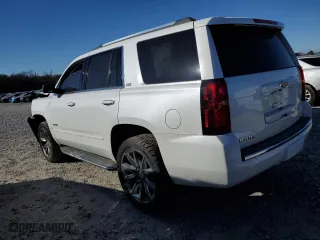 2016 Chevrolet Tahoe LTZ with VIN 1GNSKCKC1GR254325, listed as a Copart auction lot 41833005 with 115,144 mi miles and Salvage Title. Bid and sale history available at carsss.com. Image 2.