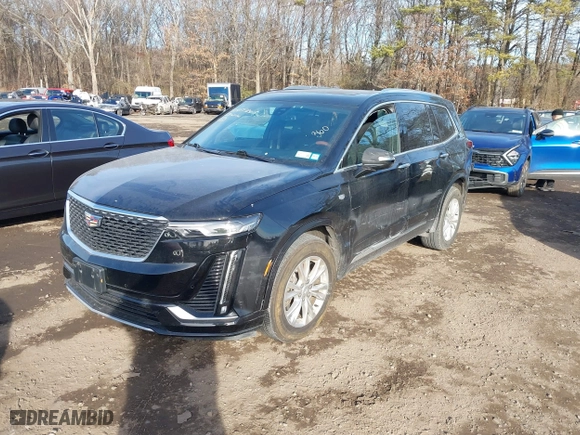2023 Cadillac XT6 Luxury with VIN 1GYKPBR41PZ136918, listed as a IAAI auction lot 41417724 with 57,949 mi miles. Bid and sale history available at carsss.com. Image 2.